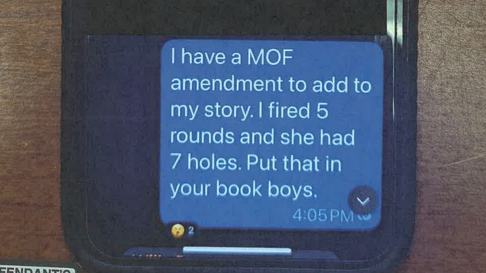 A phone, showing a text message that reads:

"I have a MOF amendment to add to my story.  I fired 5 rounds and she had 7 holes.  Put that in your book boys."