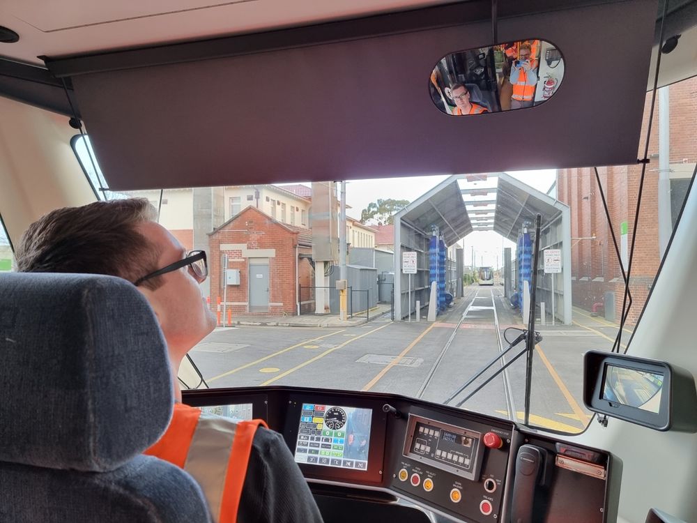 Me, in the cab of a tram, looking adoringly at the bf in the rear view mirror because he’s cute 