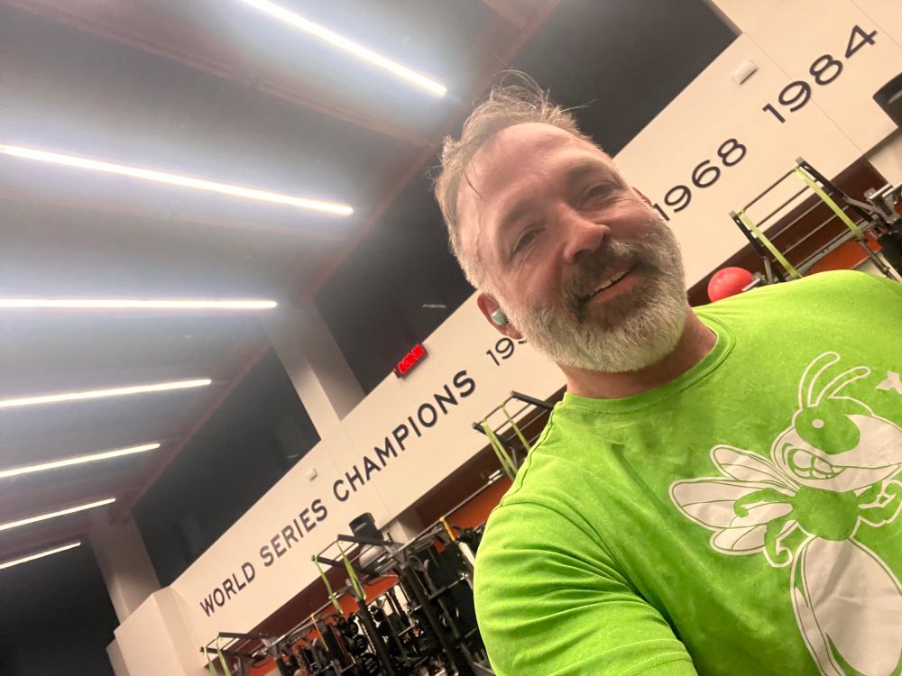 A picture of me in my boys' Edina Rugby workout shirt sweaty and tousled in the Detroit Tigers weight room in Lakeland. 