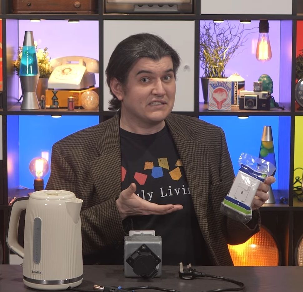 Alec from Technology Connections making a somewhat pained expression 