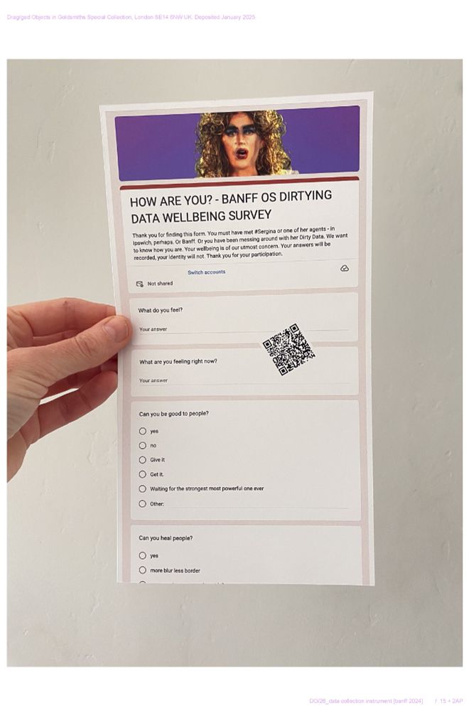 Hand holding printed out google form entitled "HOW ARE YOU - BANFF DIRTYING DATA WELLBEING SURVEY - with a QR code taking people to  the survey. Answers dirty the dirty data as the dirty data display was made with data gathered through #Sergina performances until January 2022. 
