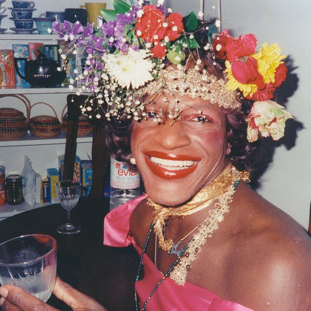 Famous photo of queer rights activist Marsha P. Johnson in a flower crown.