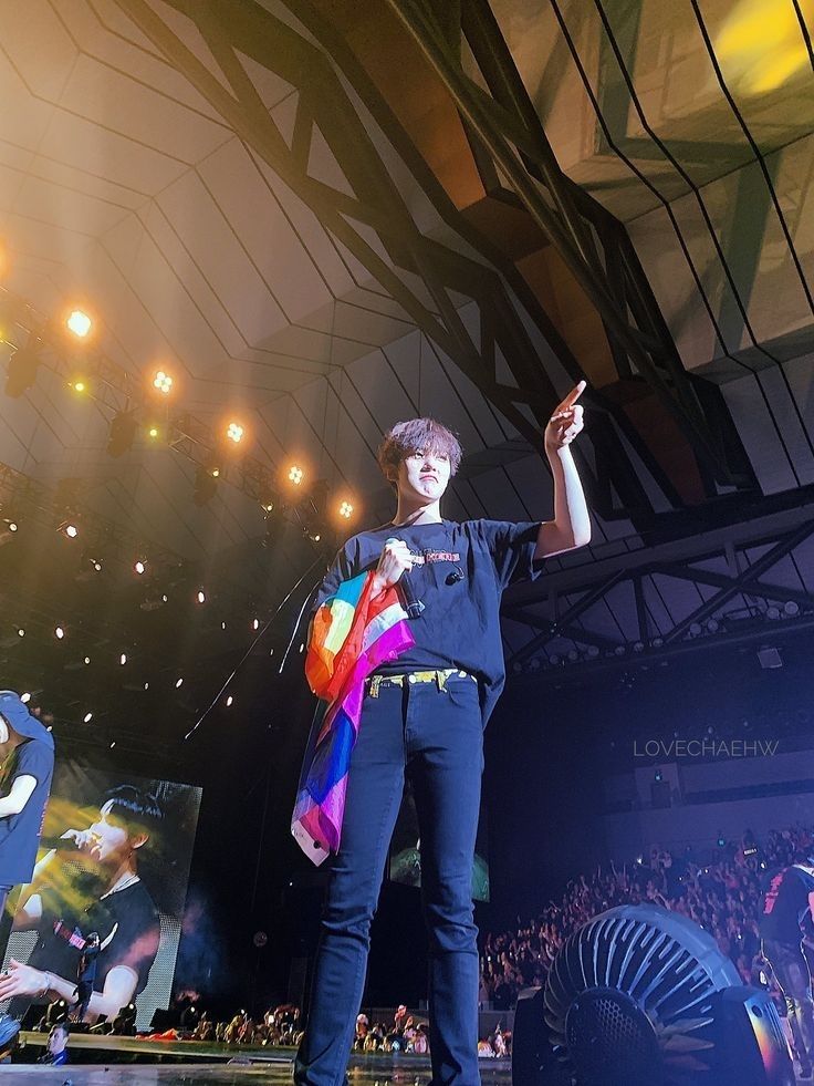 Monsta x minhyuk with a pride flag