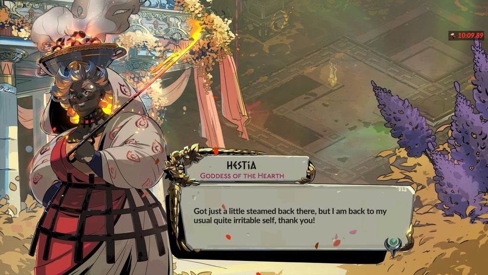 Hestia from Hades 2 saying "Got just a little steamed back there, but I am back to my usual quite irritable self, thank you!”

Hestia has deep charcoal-toned skin marked by light patches of vitiligo across her face, neck, and hands. Her short hair glows like flames, fading from deep orange to bright yellow. Resting on her head is a large bronze brazier filled with burning coals and rising smoke. She wears a white robe patterned with red hearth symbols, a red sash, and a black cage-like belt. In her hand, she holds a glowing poker or metal rod.