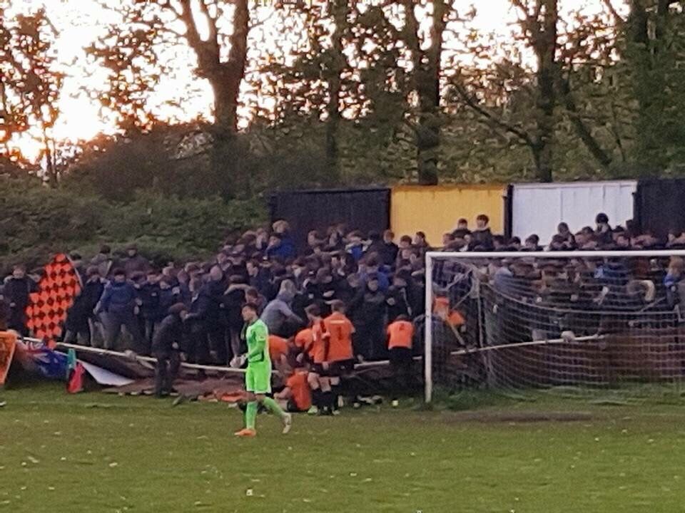 Fence collapse at Prescot Cables after a goal