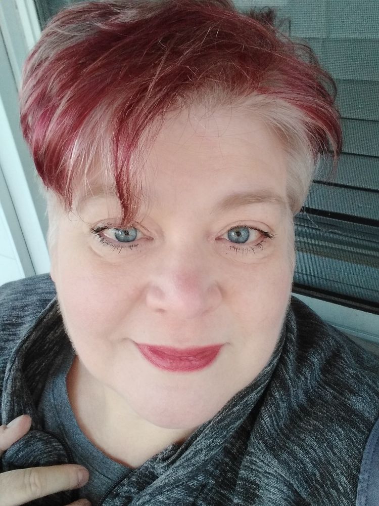 Pic of me with new red in my grey hair. Also a refrssh of my short hair cut. 