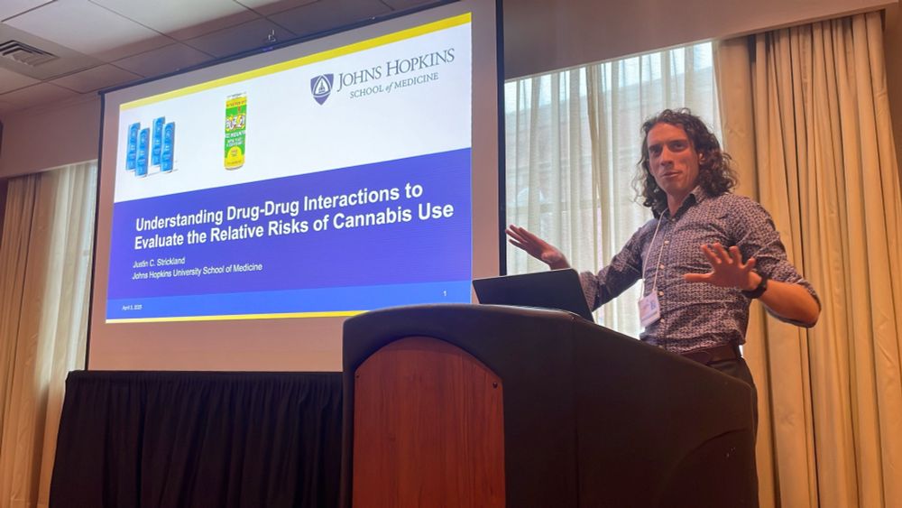 Justin enthusiastically presenting "understanding drug-drug interactions to evaluate the relative risks of cannabis use"