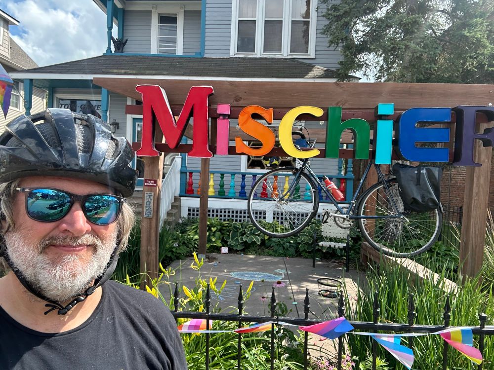 Dan and his bike in front of Mischief