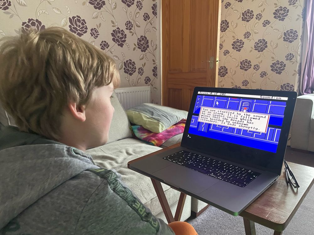 My son playing  Space Quest 