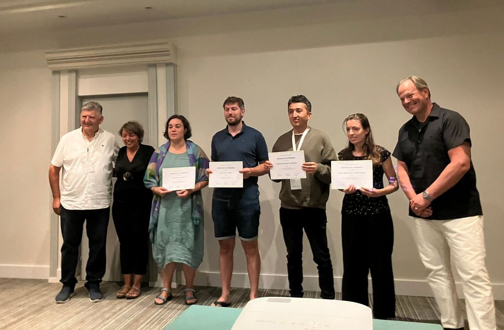 Tatiana and the other delegates receiving certificates.
