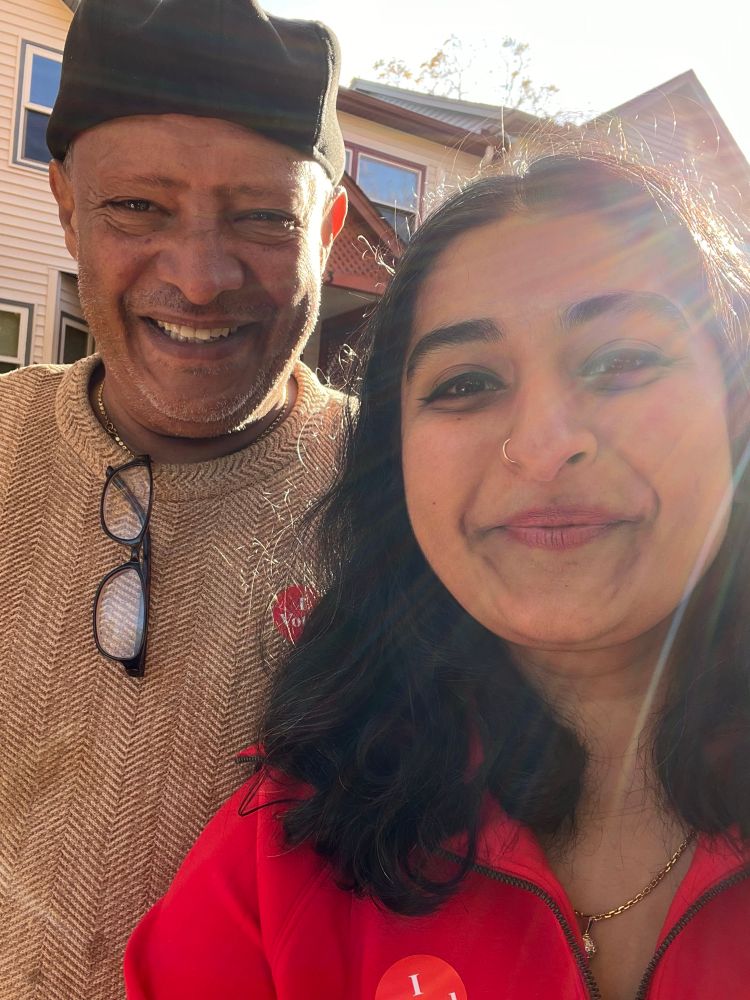 Selfie of Aisha and her neighbor. Both are returning from voting!