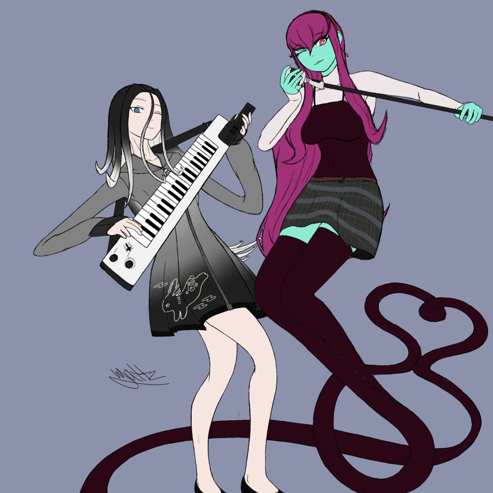 Exdo playing the keytar, as Erika poses beside her with a microphone.