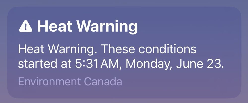 A screenshot of an Environment Canada severe weather alert indicating a heat warning started 5:31 AM, Monday, June 23.