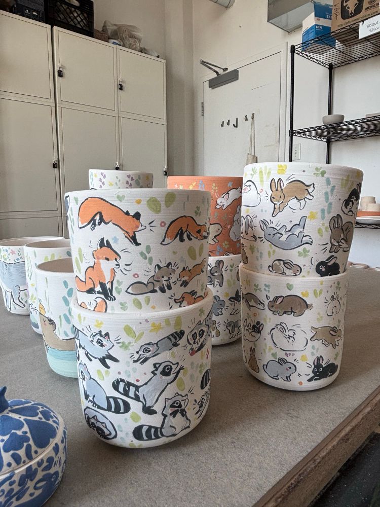 FOX and raccoon cups, bunnies cups unglazed 