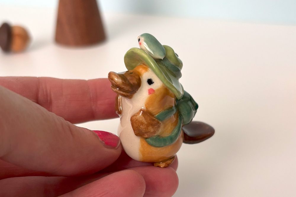 Adventure seeking platypus figurine 