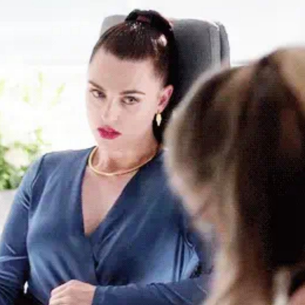 Lena Luthor still staring at Kara Danvers in a manner that can only be described as yearning. 