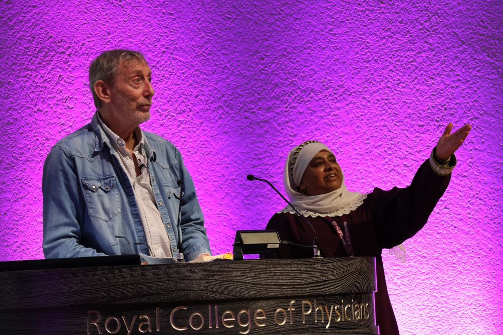 Michael Rosen with conference organiser Imrana Ghumra at HLG 2024
