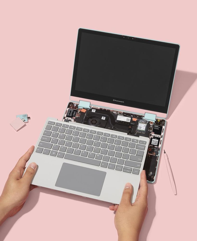 Framework Laptop 12 with the Input Cover coming off.