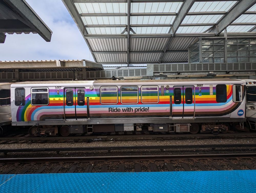 The 2024 Pride Train had a wavy, almost 60s- or 70s-like pattern of stripes that swooped up at one end and down at the other, creating bold horizontal stripes across the car body and inverted rainbow shapes at each end. The design was conscious to put Black and brown and trans colors at the cab ends of each reversible train, so no matter which way the cars were facing, those colors would be seen first as the train comes into view or enters a station.