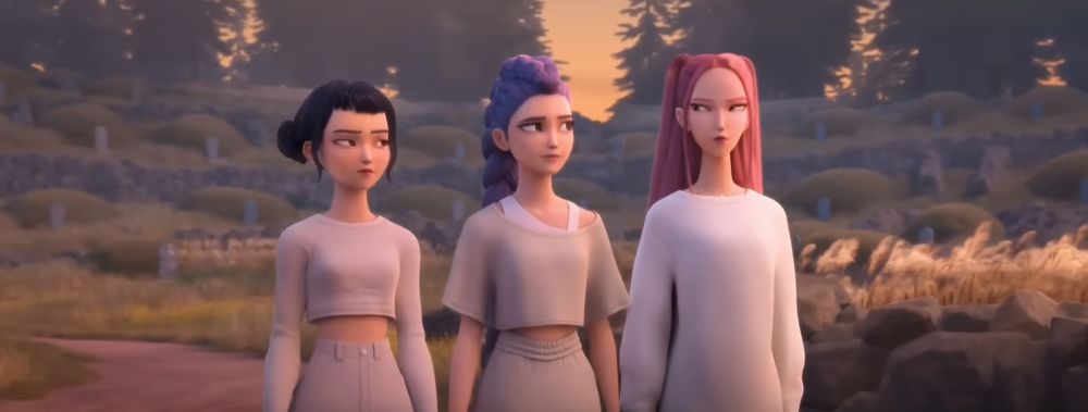 screenshot from kpop demon hunters of huntrix standing in front of a large traditional korean grave site with headstones in front of mounds