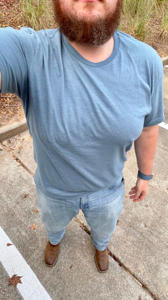 Self of Dad in his jeans and boots.