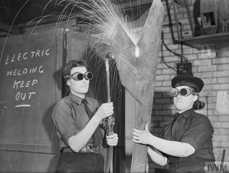 Two women welding. © IWM A 19490