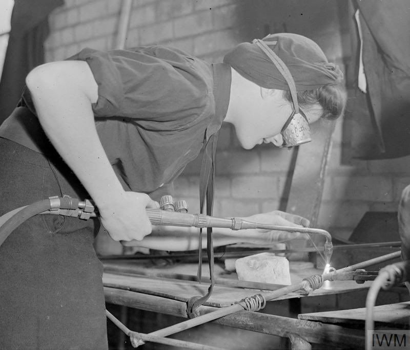 Woman welding. © IWM A 19487