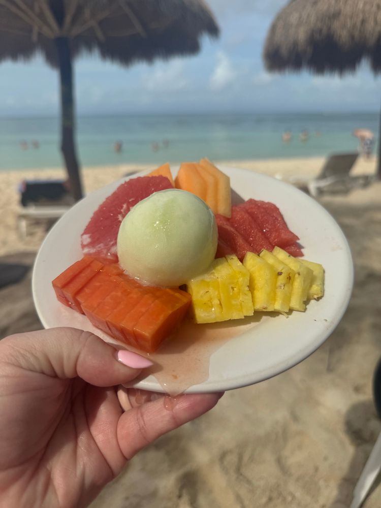 Fresh assorted fruit by the ocean 