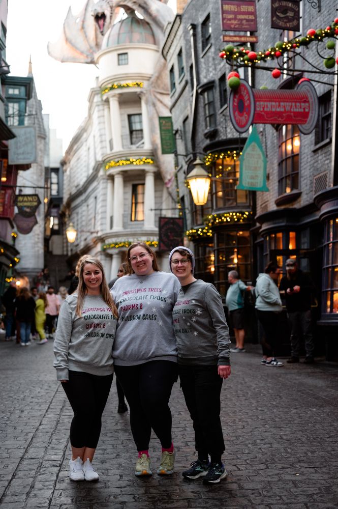Three women at Diagon Alley at the Wizarding World of Harry Potter in Orlando Florida. 