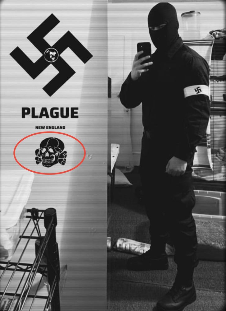 Nazi standing next to a swastika and the same symbol tattooed on Graham Platner’s chest. 