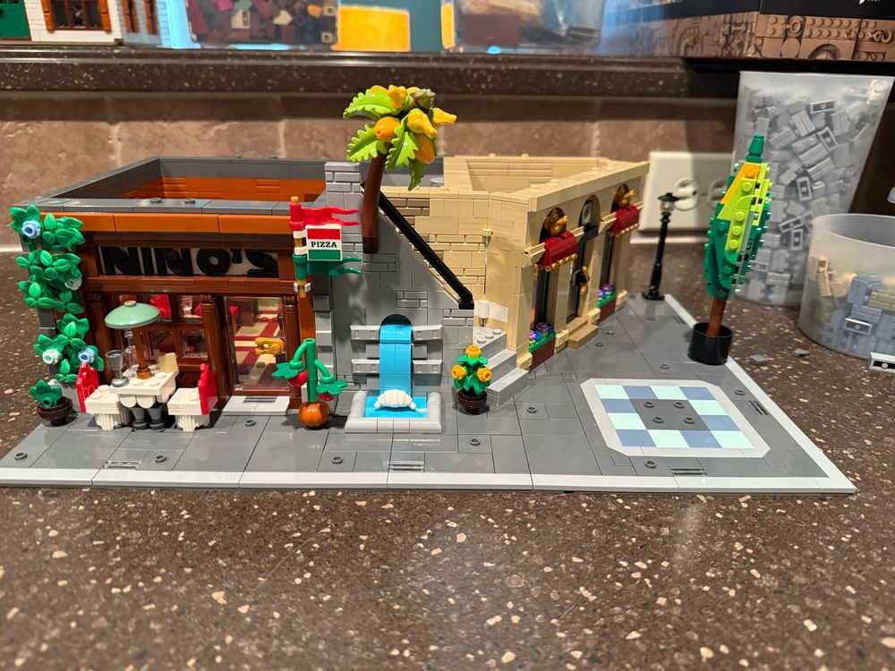 An Italian themed building including a restaurant and gelato shop, 1/3 completed.