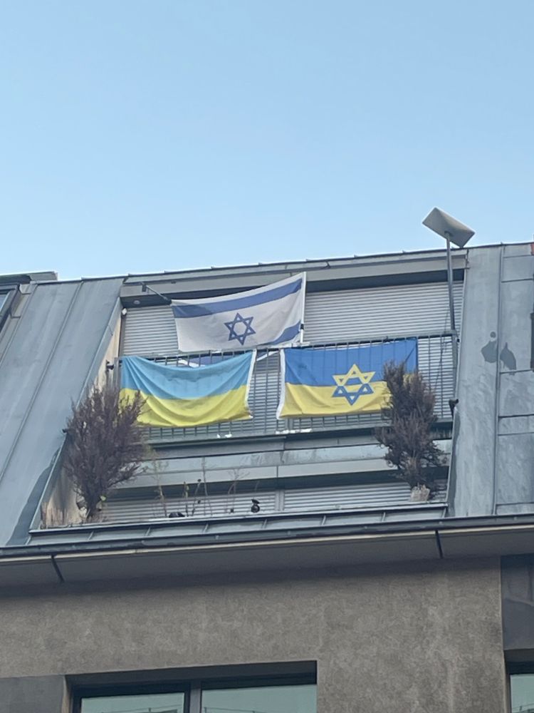 Flags of Ukraine and Israel + a third combined Ukraine flag with Star of David 