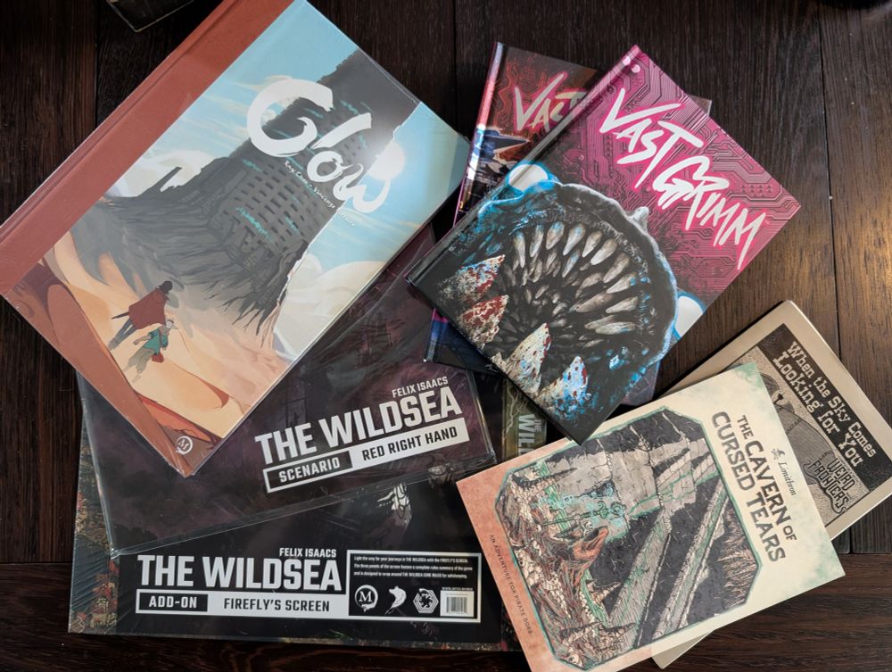 🎉Heres my @originsgamefair 2025 HAUL

🪱#vastgrimm Core Book and Space Raiders Expansion from @creaturecuration 

🏴‍☠️The Caverns of the Cursed Tears from @limithron 

🤠When the Sky Comes Looking For You from @jyamilwrites 

🌳Wildsea Scenarios Red Right Hand and Fire Fly Screen. The comic, Glow all from @mythworkshq 

#ttrpg #dnd #morkborg #game #dcc #weirdfrontiers #pirate #borg #wildsea