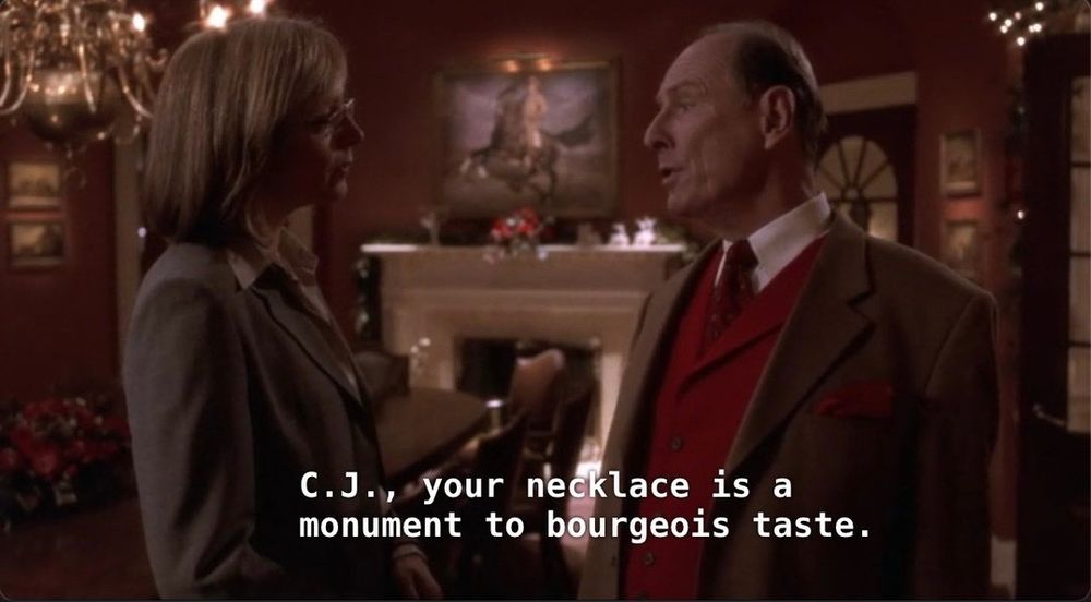 The snooty art guy from The West Wing telling off C.J. for her bourgeois taste 