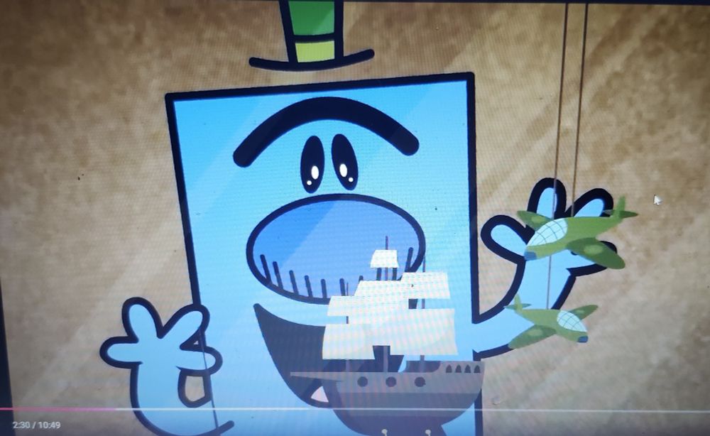 Mr Grumpy excitedly staring at a model ship