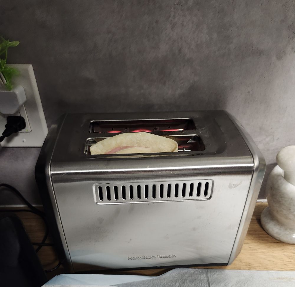 Meat cheese wrap thing in a toaster