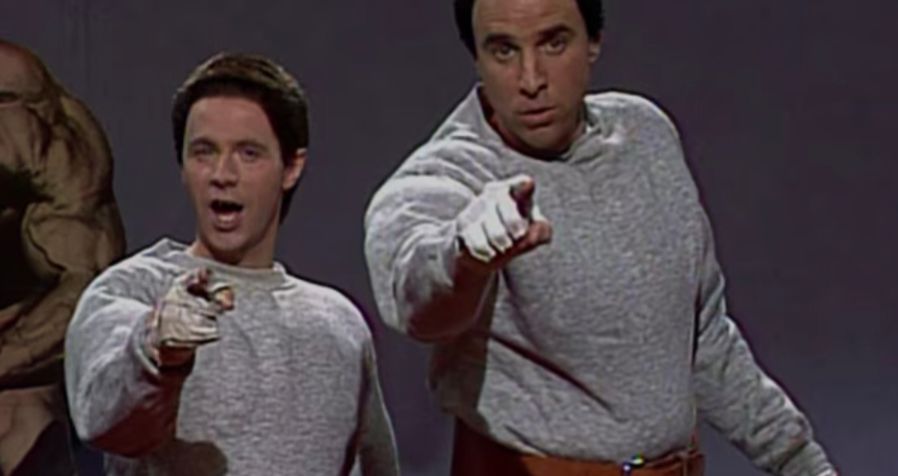 Two comic actors, Dana Carvey and Kevin Nealon, wear fake muscles under their clothes, portraying brothers who encourage fitness through weight training.