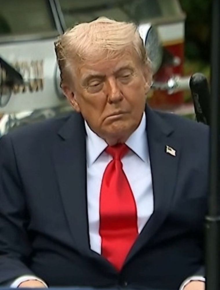 Trump slumped in his chair with one side of his mouth noticeably drooping 