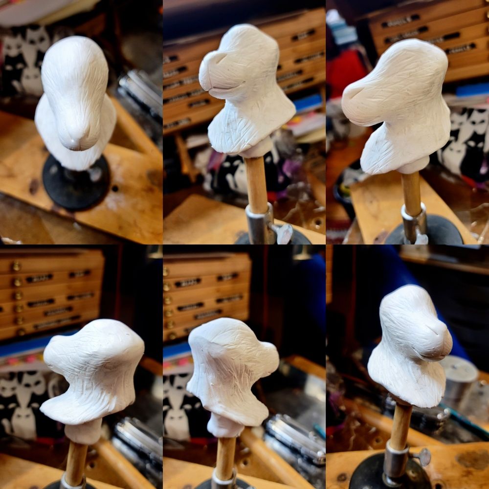 Rotation of sculpey covered muzzle and skull and neck for the bust, before being baked