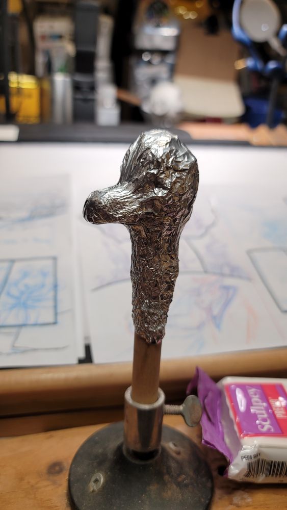 Copper wire frame wrapped in tin foil