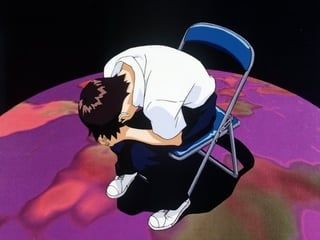 Shinji Ikari in the folding chair meme.