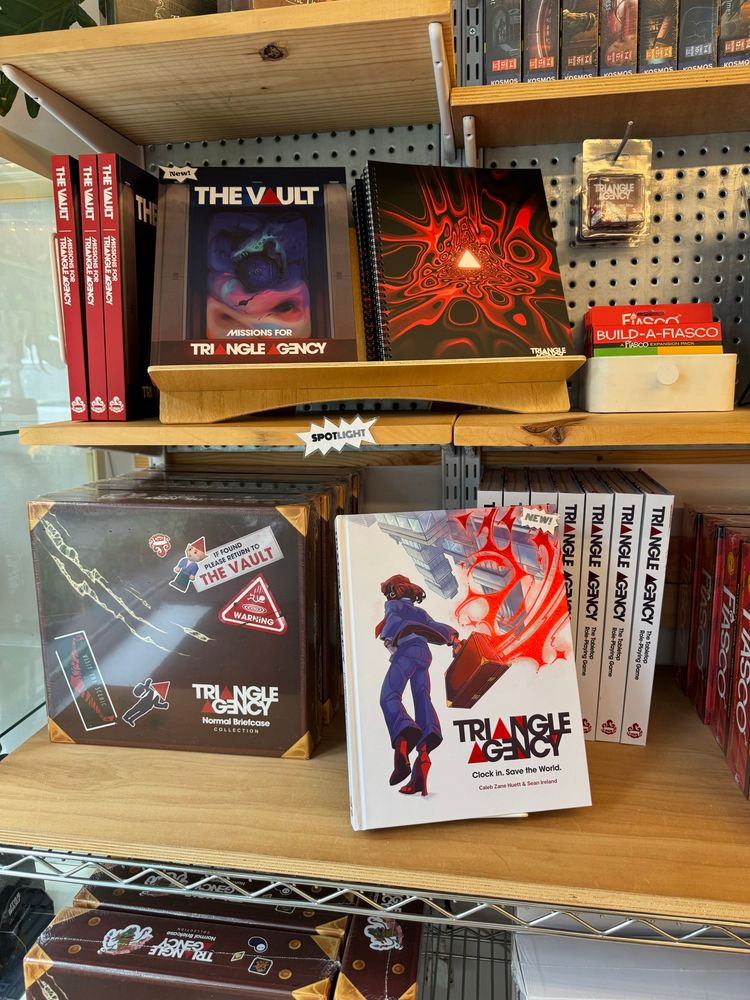 Triangle Agency books and box sets on display. 