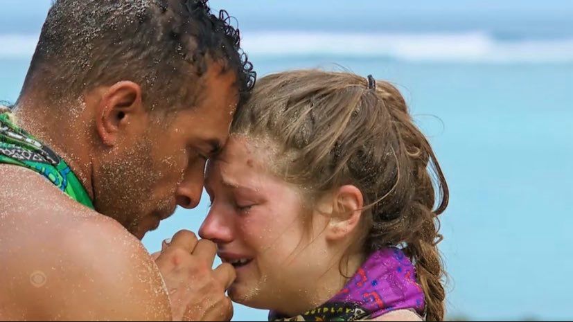 Joe and Eva pushing their foreheads against each other’s 