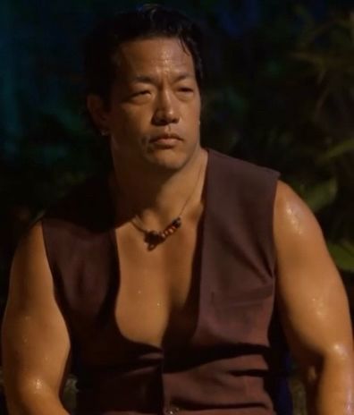 Sol soaking wet in a vest on the jury bench 