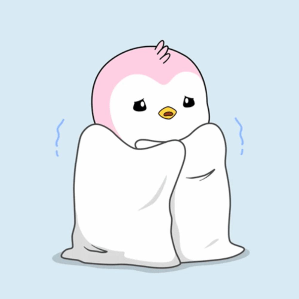 a pink and white penguin wrapped in a blanket