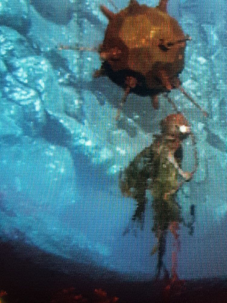 an enemy underwater with a mine on a chain. i was scared the first time i saw it in the distance!
