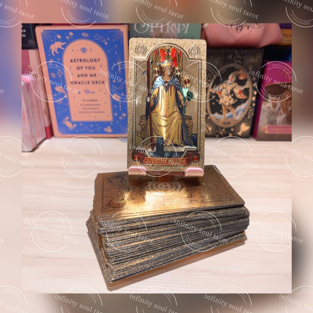 The queen of wands card on a stand. 