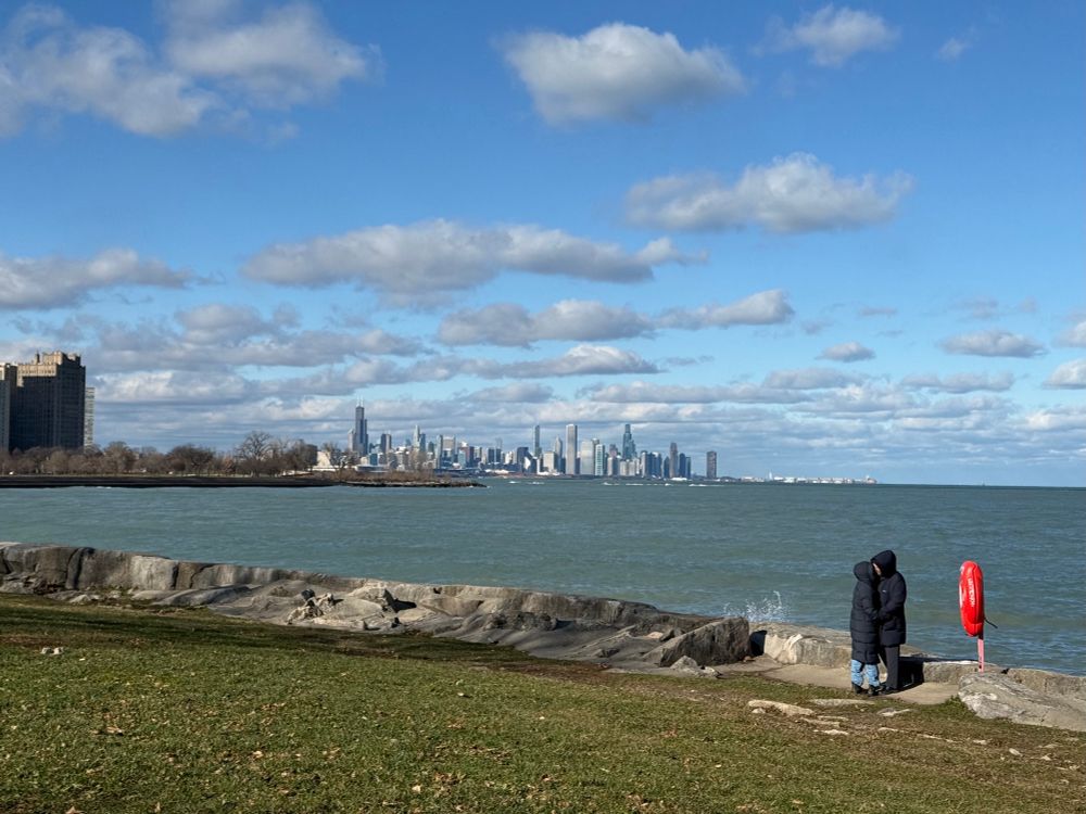 A different couple kissing in the same spot 