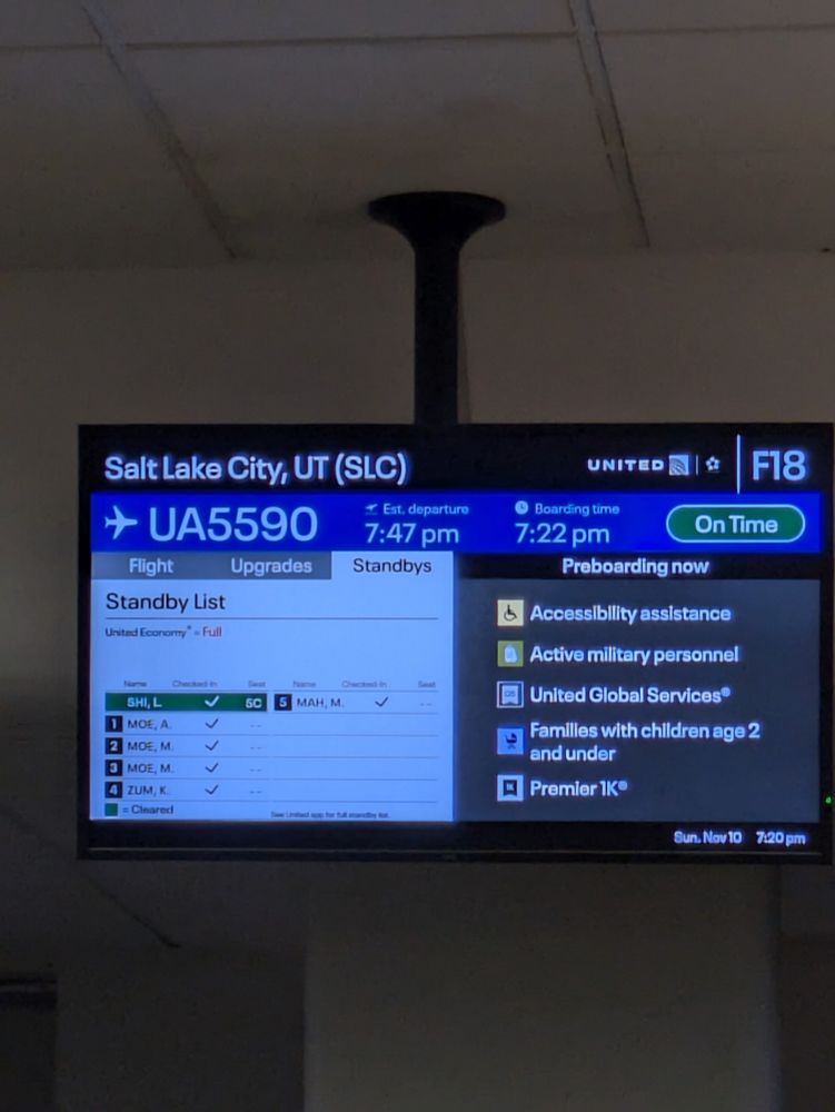 Picture of the screen at the gate for flight UA5590 to SLC