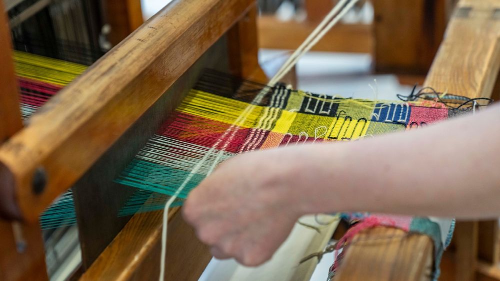 Colourful threads on traditional loom. Photo courtesy of Glasgow School of Art. 